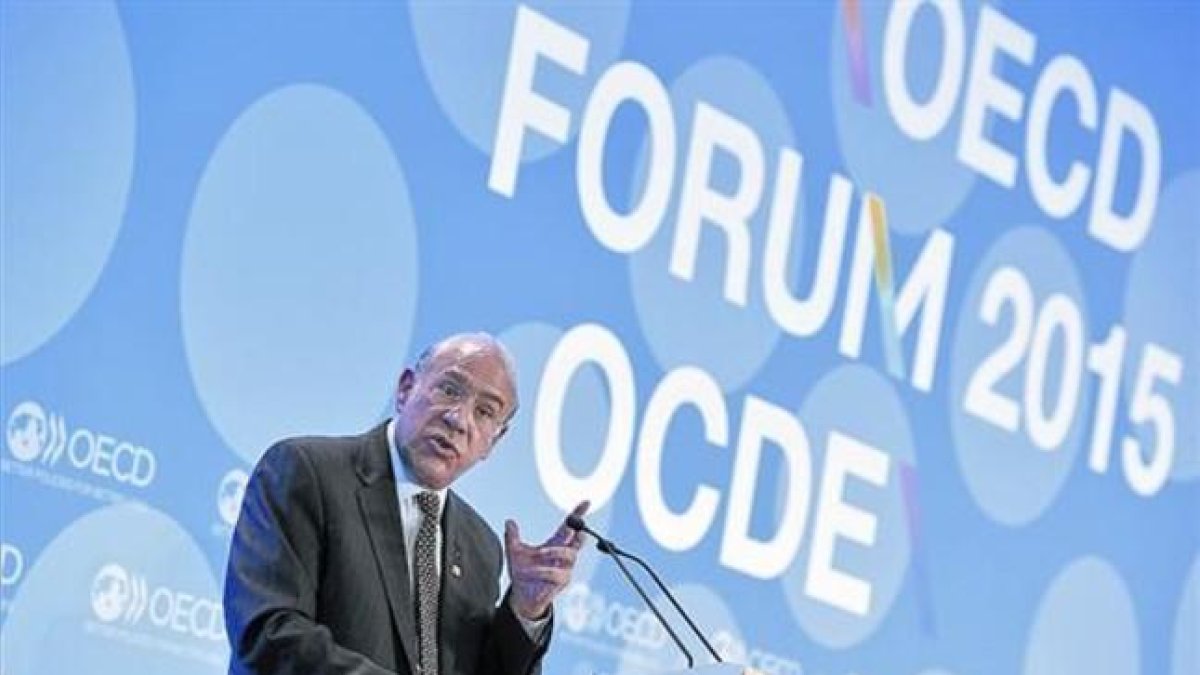El secretario general de la OCDE, José Ángel Gurría, en una presentación.-AFP / BERTRAND GUAY