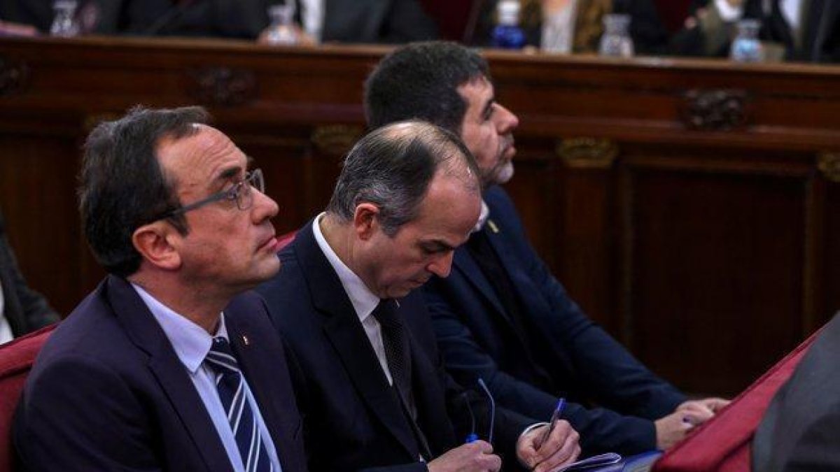 Josep Rull  Jordi Turull y Jordi Sànchez.-EFE