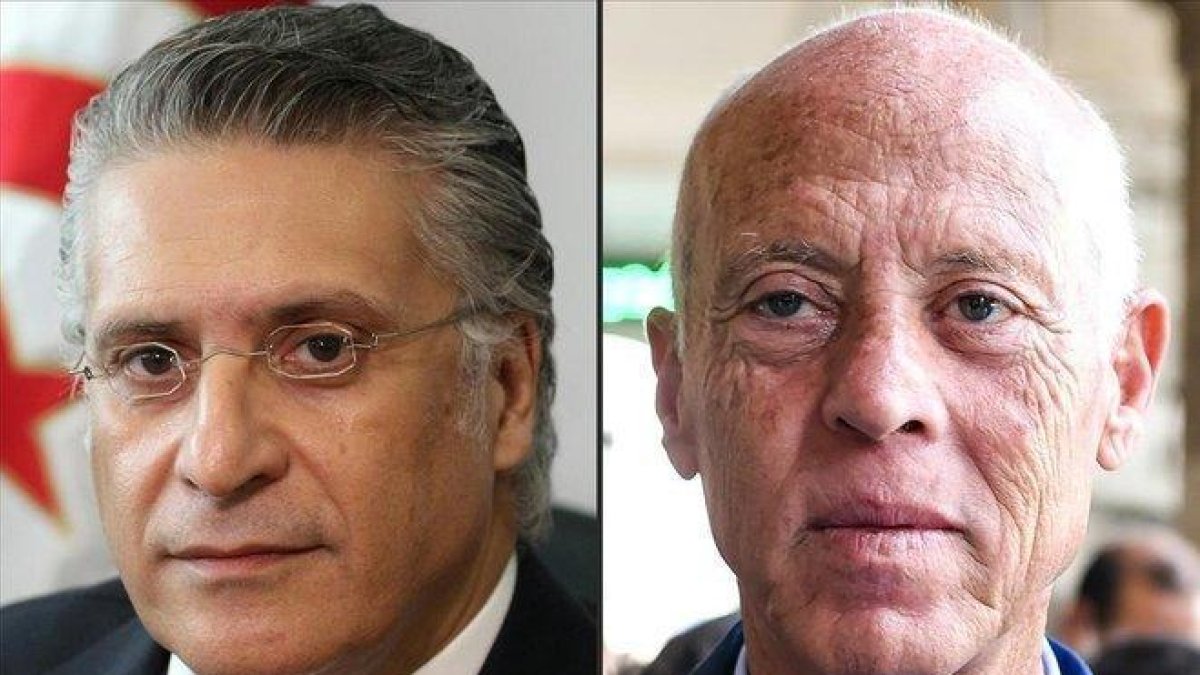 Nabil Karaoui y Kaïes Said.-AFP