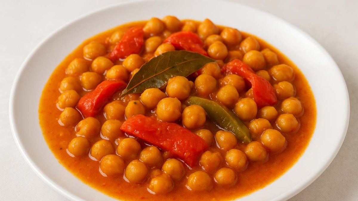 Recreación con IA del plato que nos propone Dolores Lafuente con garbanzos.