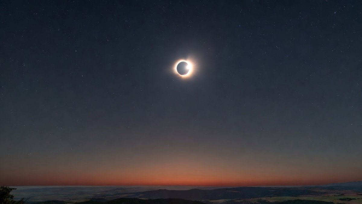 Recreción de un eclipse solar en un monte soriano en una imagen generada por IA.