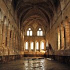 Una de las salas del monasterio, anegada el lunes tras la riada del domingo.-M.T.